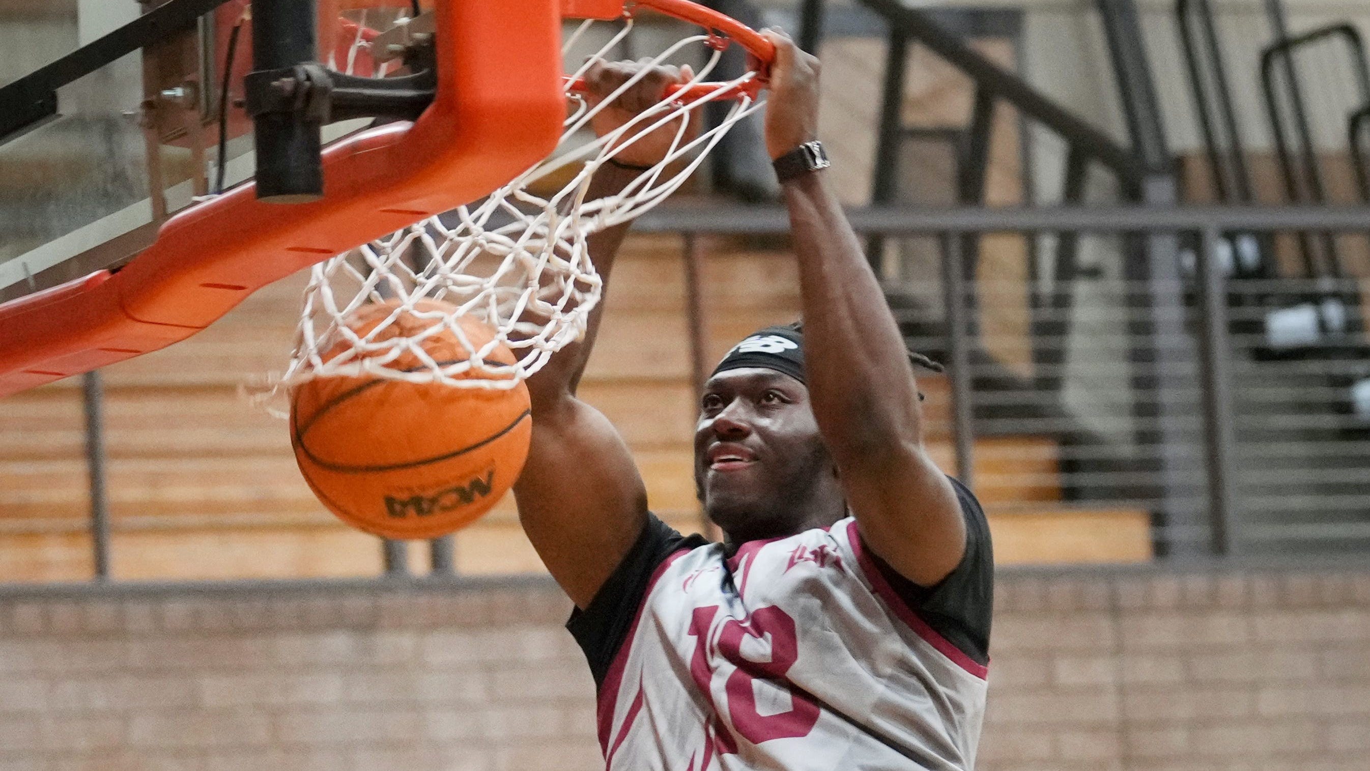 Former Ohio State receiver Marvin Harrison Jr. throws down filthy dunk