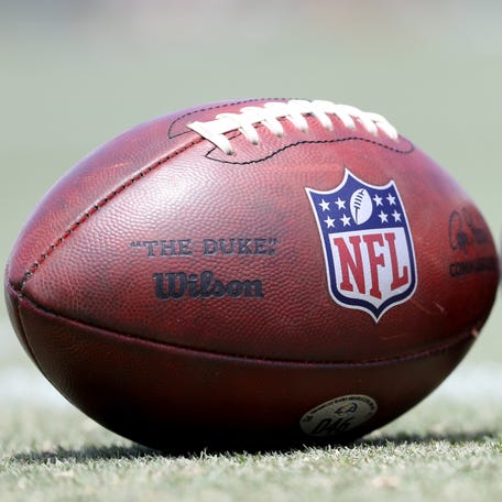 A general view of the official NFL balls on the field during Los Angeles Rams training camp at University of California Irvine.