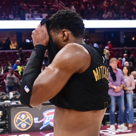 Cavaliers guard Donovan Mitchell (45) walks off the court after Game 5 against the Pacers.
