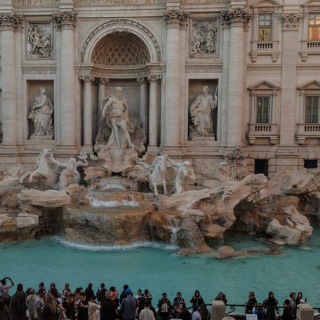 Tourists gather at the Trevi Fountain on March 25, 2025 in Rome, Italy.
