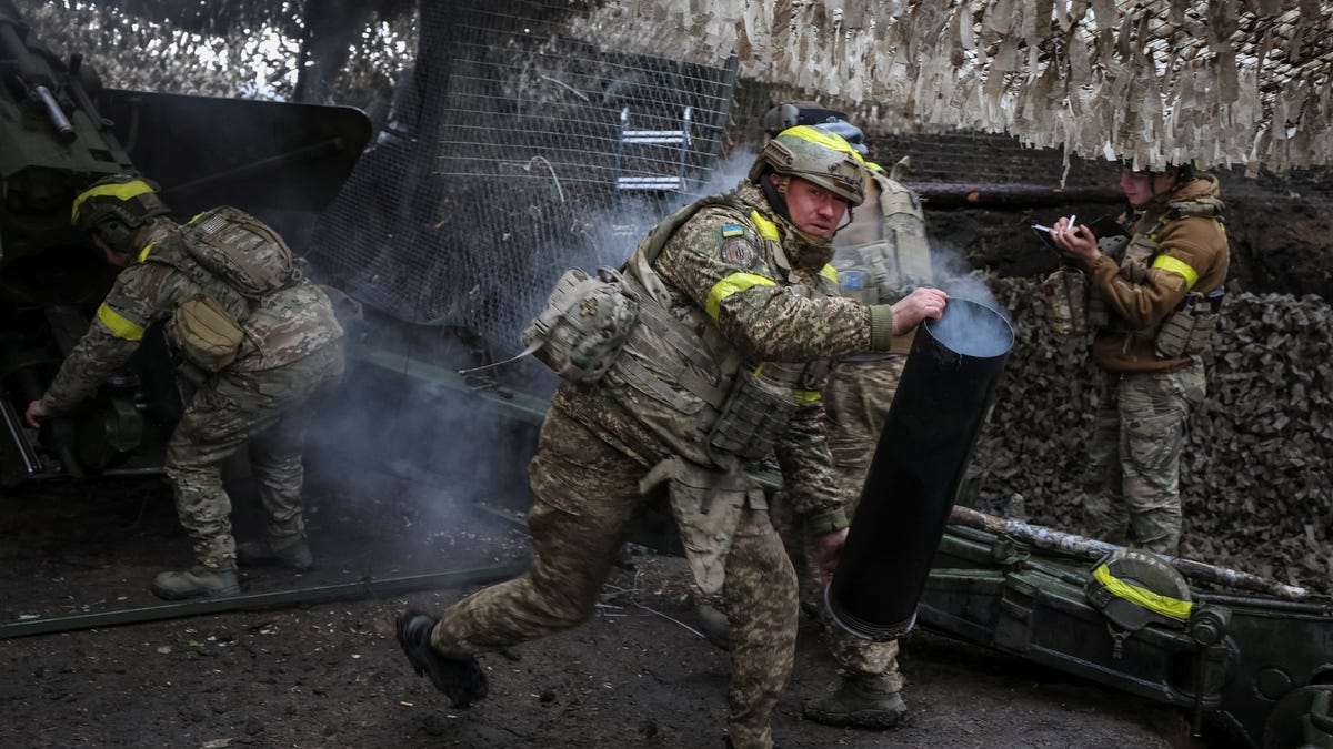 Artillerymen of the 15th Operative Purpose Brigade Kara-Dag, of the National Guard of Ukraine, fire a Giatsint-B howitzer towards Russian troops at a position on a front line, amid Russia's attack on Ukraine, near Kupiansk, Kharkiv region, Ukraine May 11, 2025.