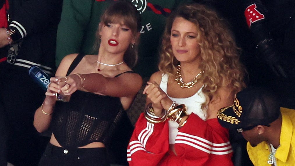 Taylor Swift, left and Blake Lively are pictured in the stands before the Kansas City Chiefs and San Francisco 49ers game at Allegiant Stadium in Las Vegas on Feb. 11, 2024.