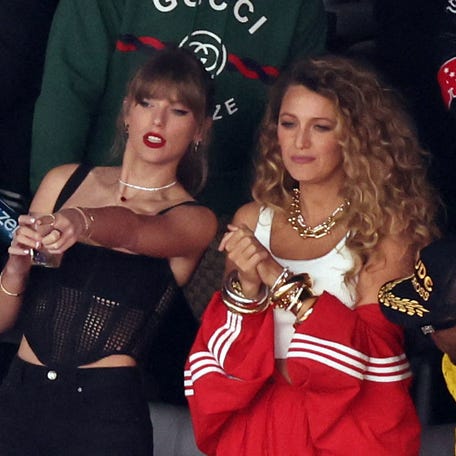 Taylor Swift, left and Blake Lively are pictured in the stands before the Kansas City Chiefs and San Francisco 49ers game at Allegiant Stadium in Las Vegas on Feb. 11, 2024.
