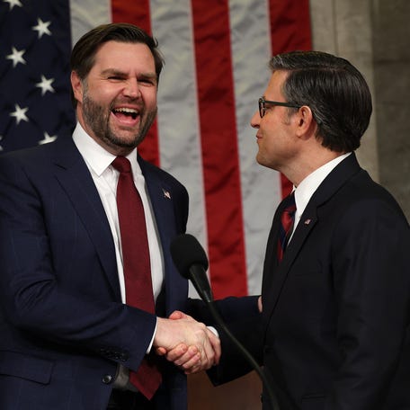 Mar 4, 2025; Washington, DC, USA; U.S. Vice President JD Vance shakes hands with Speaker of the House Mike Johnson (R-LA) as they arrive for President Donald Trump's address to a joint session of Congress at the U.S. Capitol on March 04, 2025 in Washington, DC. President Trump was expected to address Congress on his early achievements of his presidency and his upcoming legislative agenda. Mandatory Credit: Win McNamee-Pool via Imagn Images