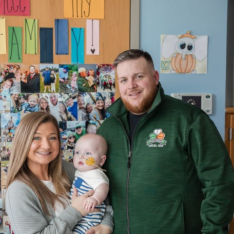 Nicole and Kyle Muldoon, of Clifton Heights, Pennsylvania, with baby KJ, who was born with a terrible genetic disorder