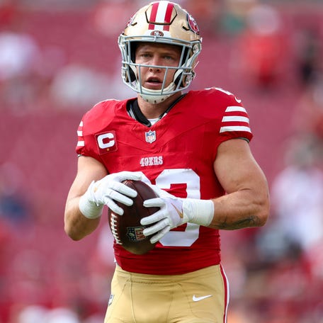 San Francisco 49ers running back Christian McCaffrey (23) warms up before a game against the Tampa Bay Buccaneers at Raymond James Stadium in Tampa on Nov. 10, 2024.