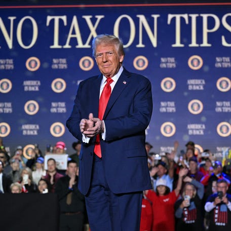 US President Donald Trump arrives to speak on his policy to end tax on tips in Las Vegas, Nevada, on January 25, 2025.
