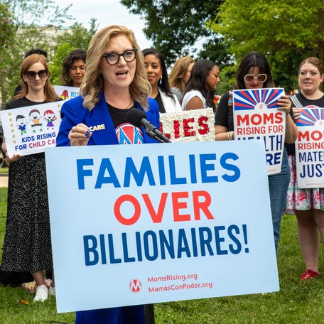 WASHINGTON, DC - MAY 08: MomsRising Founder and CEO Kristin Rowe-Finkbeiner speaks during a gathering on Capitol Hill. Moms from across the country gathered to protest expected cuts to Medicaid (Photo by Brian Stukes/Getty Images for MomsRising.org)