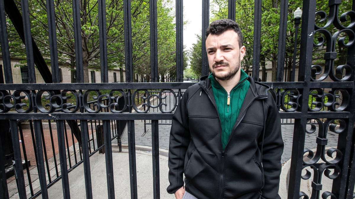 Mahmoud Khalil, 29, a graduate student at Columbia University, was notified by the school that he has been suspended. He stood outside the gates of the campus in Manhattan April 30, 2024.