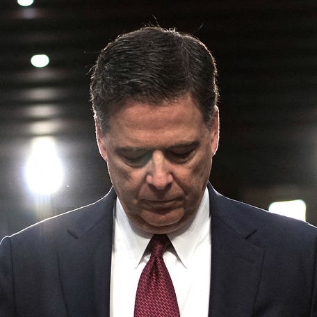 Ousted FBI director James Comey listens during a hearing before the Senate Select Committee on Intelligence on Capitol Hill June 8, 2017 in Washington, DC..