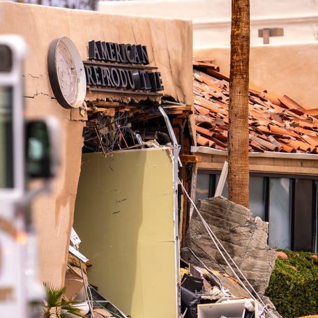 The side of American Reproductive Centers clinic is seen after an explosion being investigated by law enforcement as an intentional act of violence in Palm Springs, Calif., Saturday, May 17, 2025.