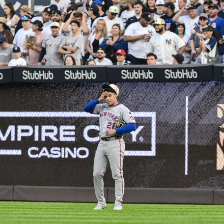 New York Mets outfielder Juan Soto (22) looks on from right field during the first inning against the New York Yankees.