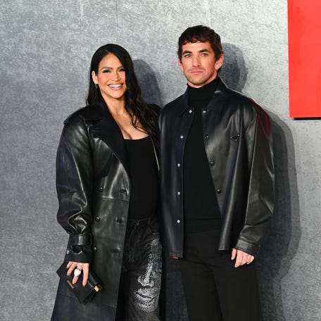 Cassie and Alex Fine attend the Global Premiere of "MobLand" at Odeon Luxe Leicester Square on March 27, 2025, in London.