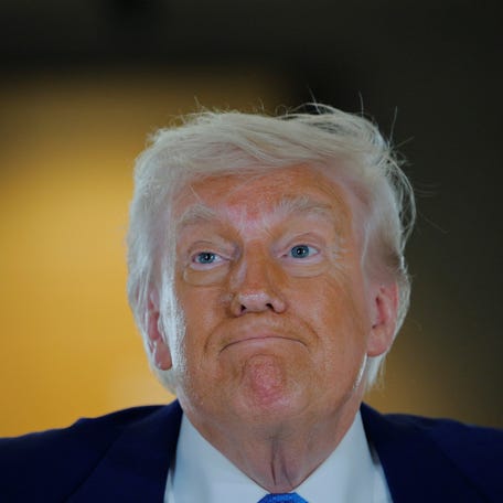 U.S. President Donald Trump reacts as he visits the Abrahamic Family House during his visit in Abu Dhabi, United Arab Emirates, May 16, 2025. REUTERS/Brian Snyder
