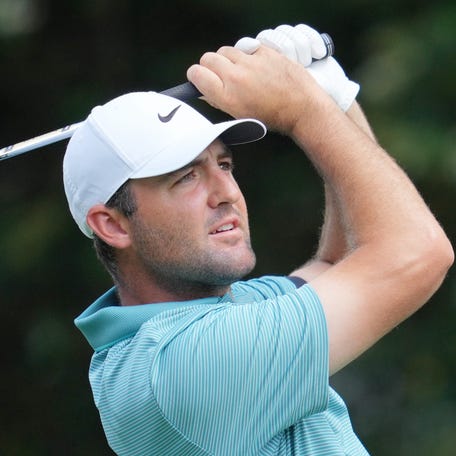 Scottie Scheffler tees off on the sixth hole during the third round of the PGA Championship at Quail Hollow.
