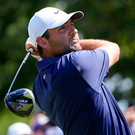 Scottie Scheffler tees off on the third hole during the final round of the 2025 PGA Championship at Quail Hollow.