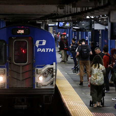 Commuters wait for a train at the 33rd Street Path Transit line after New Jersey Transit's locomotive engineers went on strike on May 16, 2025.