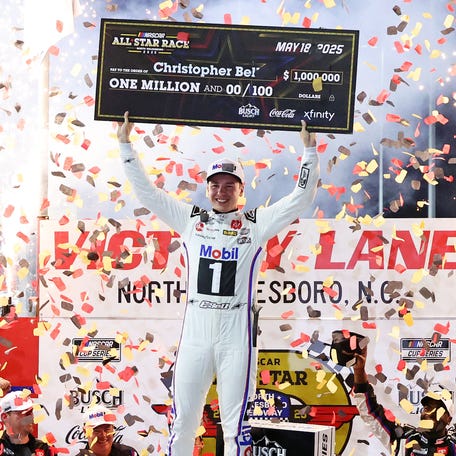 Christopher Bell celebrates winning the NASCAR All-Star Race at North Wilkesboro Speedway on May 18, 2025.