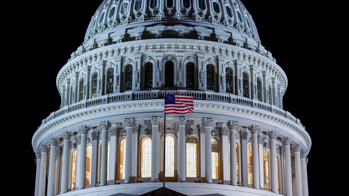 The U.S. Capitol is pictured from a distance at night in Washington.