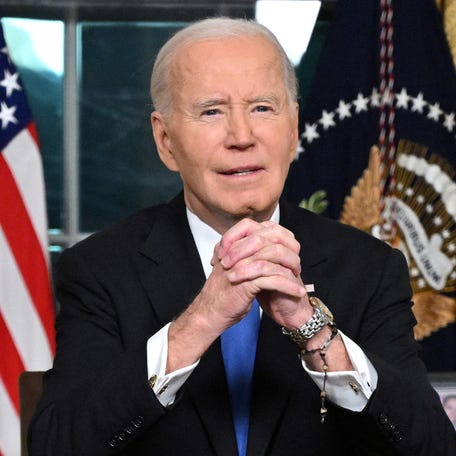 President Joe Biden gestures as he delivers his farewell address to the nation from the Oval Office of the White House on January 15.