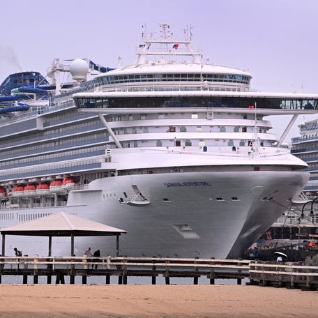 People look at the Carnival Adventure cruise ship moored at Melbourne's Station Pier on March 20, 2025. (Photo by William WEST / AFP) (Photo by WILLIAM WEST/AFP via Getty Images)