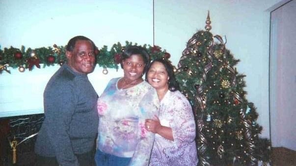 Aisha Adkins and her parents.