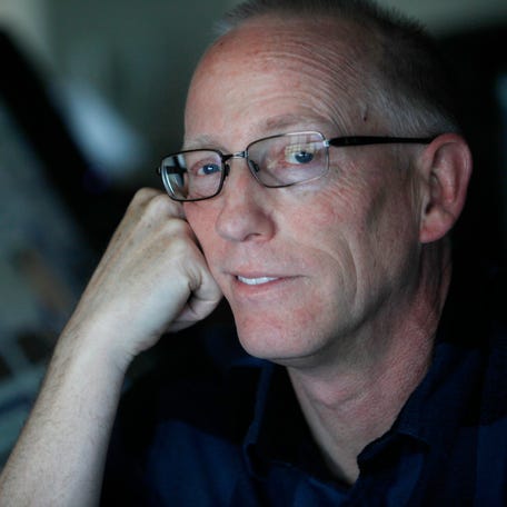Scott Adams, cartoonist and author and creator of "Dilbert," poses for a portrait in his home office on January 6, 2014 in Pleasanton, Calif.