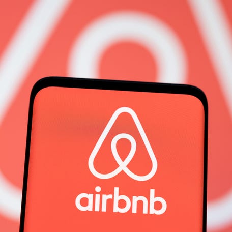 Airbnb logo is seen displayed in this illustration taken, May 3, 2022.