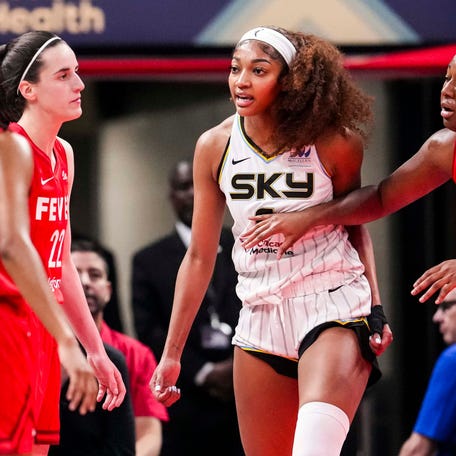 Chicago Sky forward Angel Reese (5) reacts to a flagrant foul from Indiana Fever guard Caitlin Clark (22) on Saturday, May 17, 2025, during a game between the Indiana Fever and the Chicago Sky at Gainbridge Fieldhouse in Indianapolis. The Indiana Fever defeated the Chicago Sky, 93-58.
