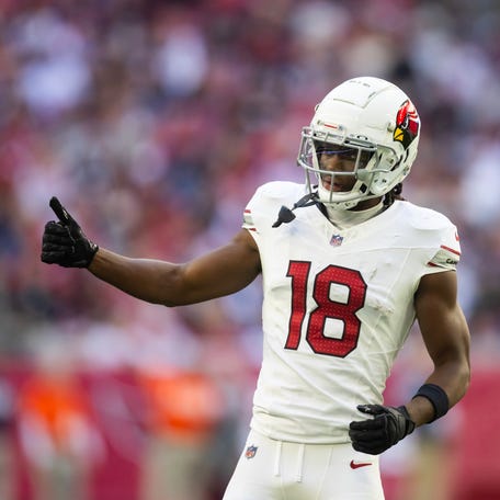 Dec 15, 2024; Glendale, Arizona, USA; Arizona Cardinals wide receiver Marvin Harrison Jr. (18) against the New England Patriots at State Farm Stadium. Mandatory Credit: Mark J. Rebilas-Imagn Images