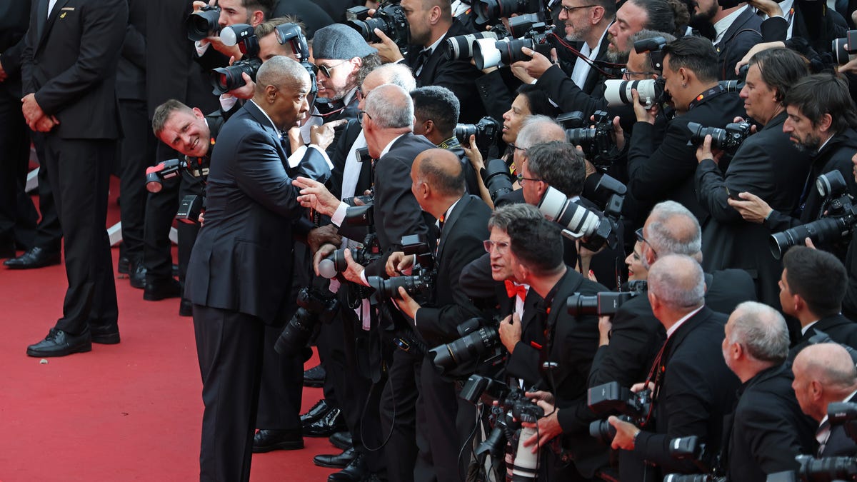 Denzel Washington attends the "Highest 2 Lowest" red carpet at the 78th annual Cannes Film Festival at Palais des Festivals on May 19, 2025, in Cannes, France.