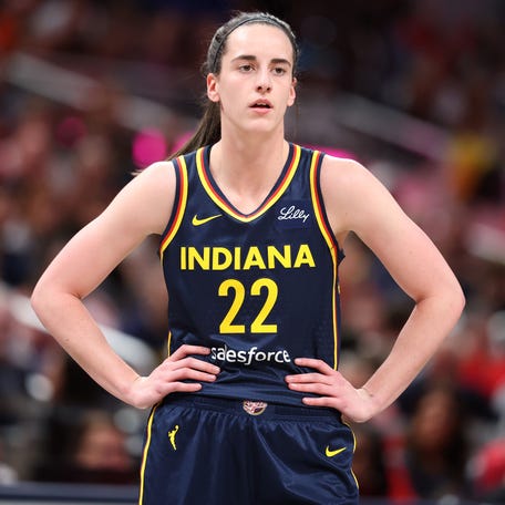 Indiana Fever star Caitlin Clark stands on the court during the game against the Atlanta Dream at Gainbridge Fieldhouse in Indianapolis on May 20, 2025.
