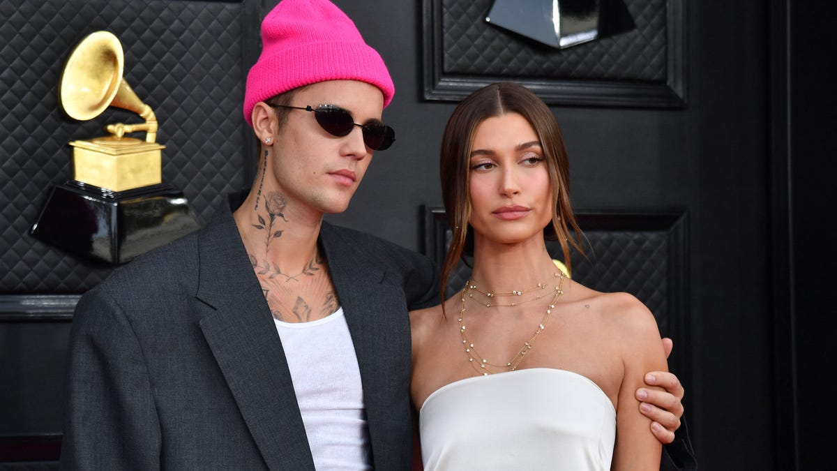 Justin Bieber, left, and Hailey Bieber attend the Grammy Awards on April 3, 2022.