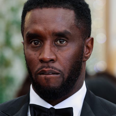 Sean "Diddy" Combs poses on the red carpet during Oscars arrivals at the 94th Academy Awards in Los Angeles on March 27, 2022.