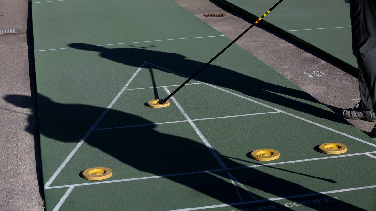 Shuffleboard players gathered near the River Walk Center in downtown Fort Pierce on Monday, Dec. 19, 2022, for a two-day tournament hosted by the Florida Shuffleboard Association. The retirees used a little over half of the courts with a view of the Indian River Lagoon during the tournament Monday morning, competing against players from as far away as Fort Myers.