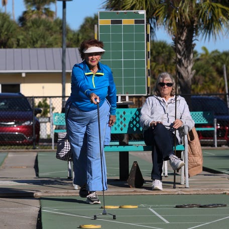 Shuffleboard players gathered near the River Walk Center in downtown Fort Pierce on Monday, Dec. 19, 2022, for a two-day tournament hosted by the Florida Shuffleboard Association. The retirees used a little over half of the courts with a view of the Indian River Lagoon during the tournament Monday morning, competing against players from as far away as Fort Myers.