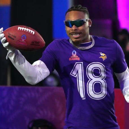 Justin Jefferson of the Minnesota Vikings (18) catches the ball during the Satisfying Catch event at the Pro Bowl Skills Challenge.