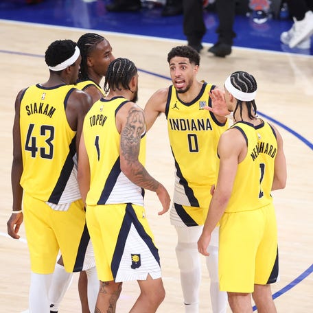 Indiana Pacers guard Tyrese Haliburton (0) meets with teammates on the court in the second half against the New York Knicks during game one of the eastern conference finals for the 2025 NBA Playoffs at Madison Square Garden in New York on May 21, 2025.