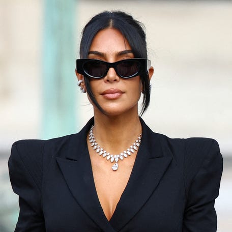 Kim Kardashian leaves the courthouse after testifying in the trial of 10 people, accused of stealing millions of dollars worth of jewelry from her and holding her at gunpoint in her apartment during Paris Fashion Week in 2016, in Paris on May 13, 2025.