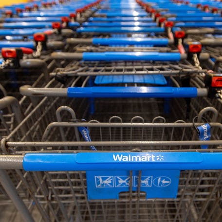 Shopping carts are lined up inside a Walmart in Hamilton, Ontario, Canada on Jan. 28, 2025.