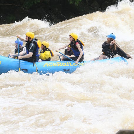 Whitewater rafting through the New River Gorge.