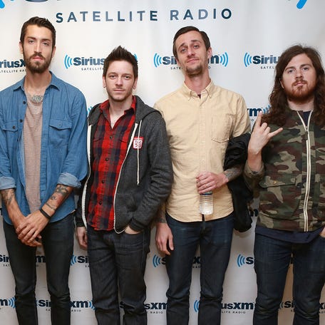The Devil Wears Prada members Mike Hranica, from left, Andy Trick, Daniel Williams, Chris Rubey and Jeremy DePoyster visit SiriusXM Studios in New York City on Sept. 18, 2013.