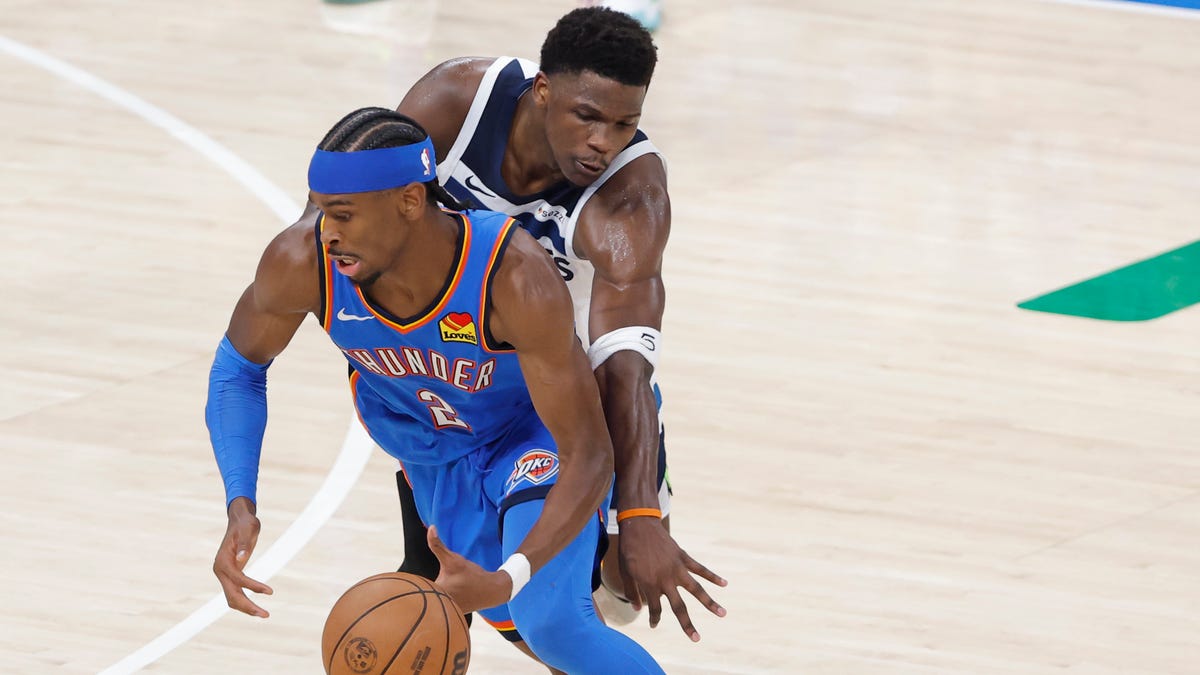 Anthony Edwards tries to swipe the ball from Shai Gilgeous-Alexander during Game 2 of the Western Conference finals.
