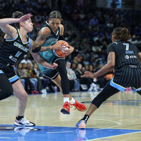 May 22, 2025; Chicago, Illinois, USA; New York Liberty guard Natasha Cloud (9) drives to the basket against the Chicago Sky during the first half at Wintrust Arena. Mandatory Credit: Kamil Krzaczynski-Imagn Images