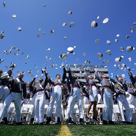 May 27, 2023; West Point, NY, USA; Graduating cadets toss their covers in the air at the end of the 2023 Graduation and Commissioning Ceremony at Michie Stadium on the campus of U.S. Military Academy at West Point on Saturday, May 27, 2023.