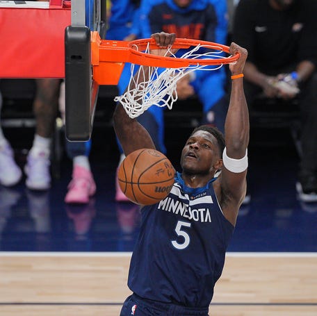 Minnesota Timberwolves guard Anthony Edwards (5) dunks the ball against the Oklahoma City Thunder during the first half of Game 3