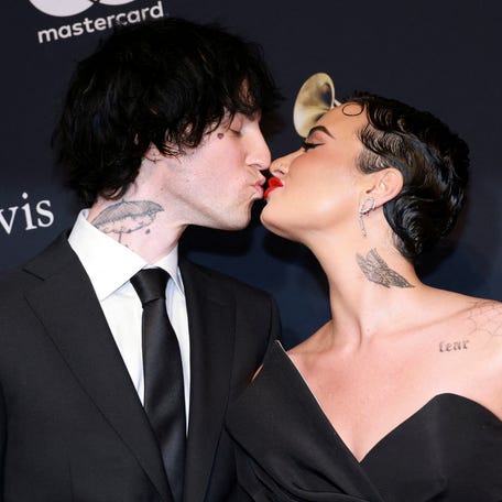 Demi Lovato, right, and Jordan Lutes attend the Pre-Grammy Gala in Los Angeles on Feb. 4, 2023.