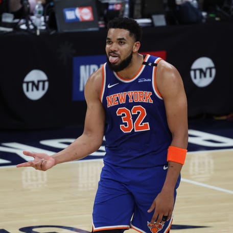 New York Knicks center Karl-Anthony Towns (32) reacts during the fourth quarter of Game 3 against the Indiana Pacers.