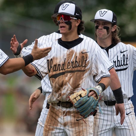 Vanderbilt players celebrate after their defeat of Tennessee in the SEC baseball tournament at Hoover Met in Birmingham, Ala., on Saturday, May 24, 2025.