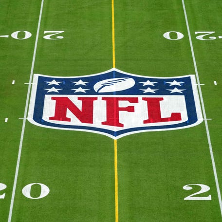 Feb 1, 2025; Orlando, FL, USA; An overall view of the NFL shield logo at midfield on the Camping World Stadium flag football field. Mandatory Credit: Kirby Lee-Imagn Images